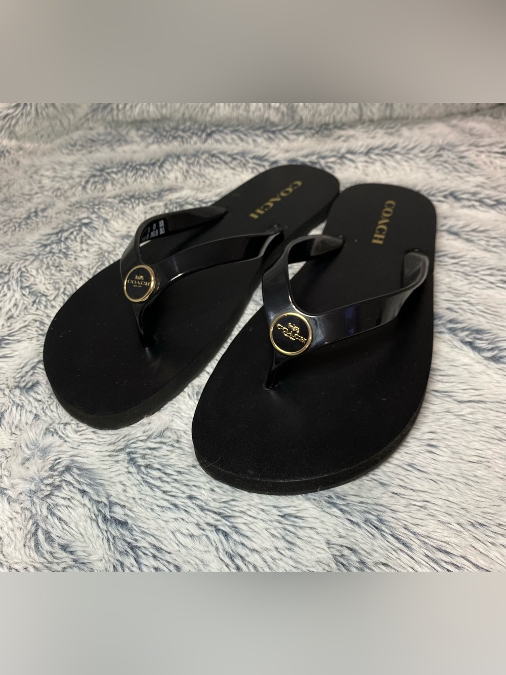 Coach Black Flip Flop Sandals with Gold Logo Medallions